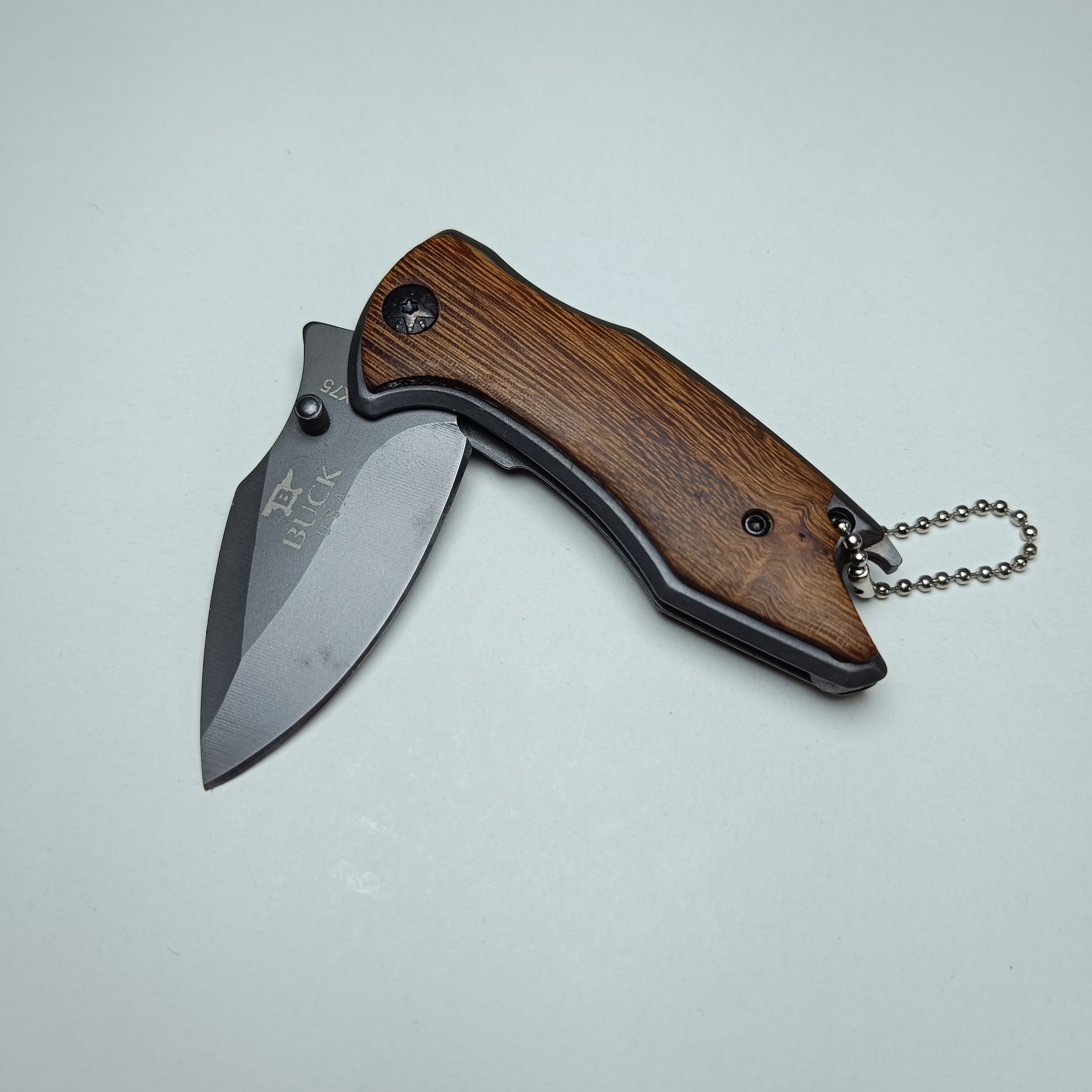 چاقوی جیبی تاشو Buck مدل X75 (طرح چوبی کلاسیک)